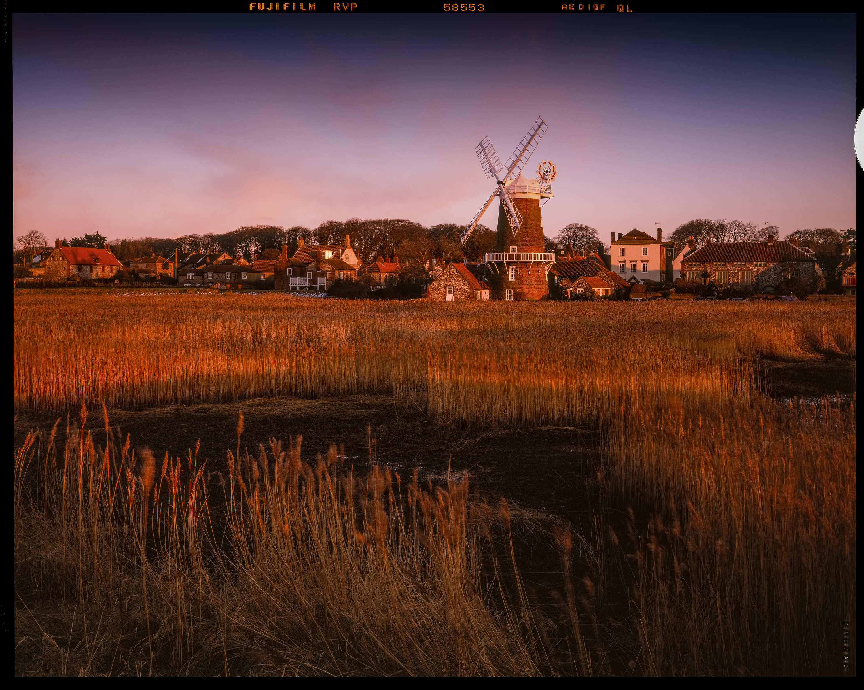 4x5 large format landscape photograph of Cley windmill and marshes